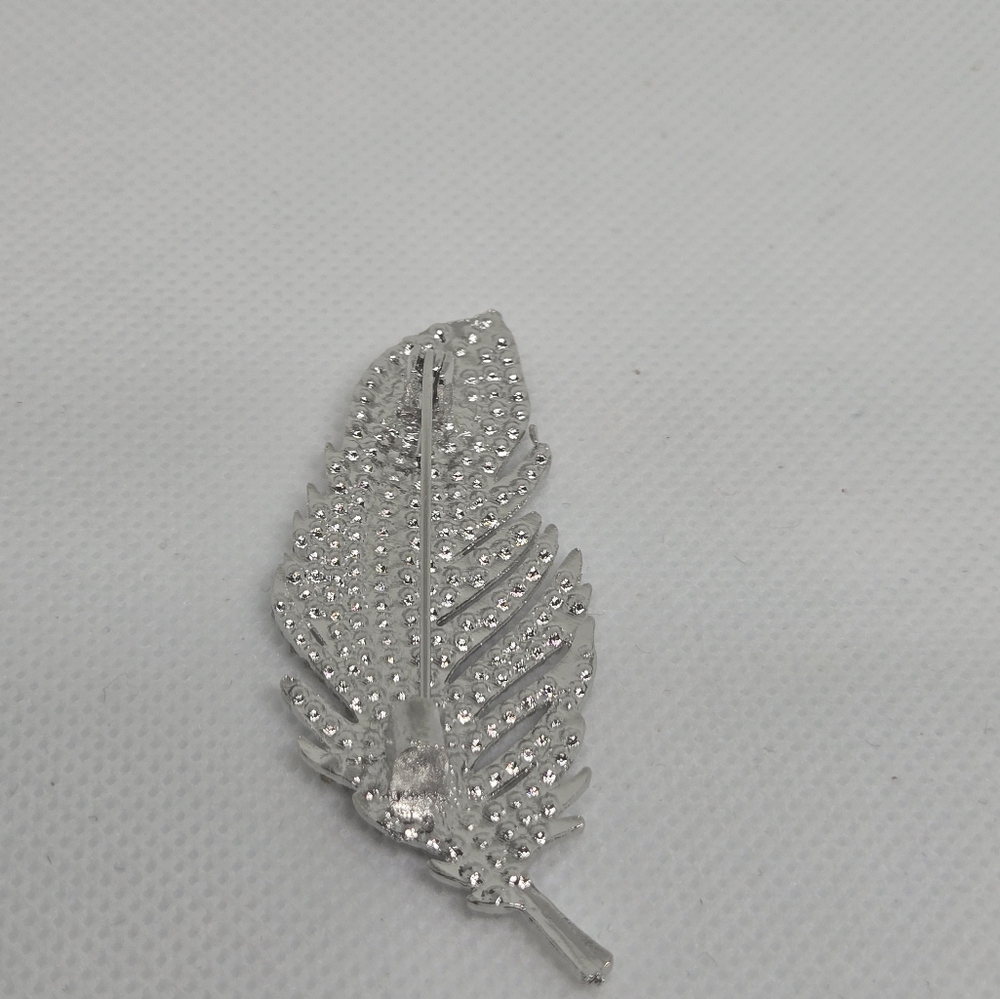 Black Top with Silver Feather Brooch